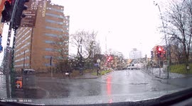 DASHCAM - RED LIGHT JUMPER! Driver of white car passing through lights after dashcam vehicle light show GREEN!