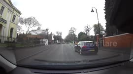 Impatient driver recklessly overtakes at double the 20mph speed limit on residential road in Birmingham, England