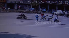 Teacher survives being hit by motorbike as she saves students