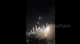 Footage 1:Massive fire at Dubai skyscraper interrupts New Year's Eve fireworks 