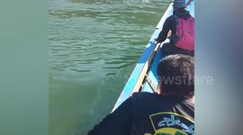 Passing tourists rescue couple drowning in river in Thailand
