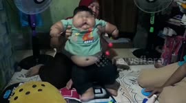 Massive 16-month-old boy weighs astonishing 60 pounds, wears XXXL diapers, father's clothes