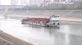 Cargo Ships Pass Through the Gezhouba Section of The Yangtze River in Yichang, China