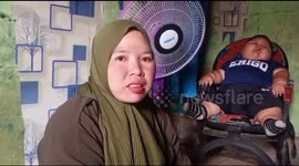 The story of Mrs. Kenzi, a giant toddler in Bekasi, West Java, Indonesia, eats normal porridge twice a day