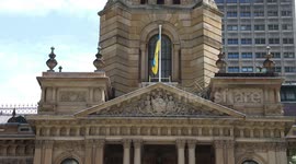 Ukrainian flag is flown on Sydney Town Hall, Australia