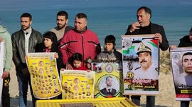 Palestinians take part in racing Pigeon sport as supporting of prisoner in Israeli jails on a beach along the Gaza sea barrier on the border with Israel near Kibbutz Zikim, north of Beit Lahia in the northern Gaza Strip