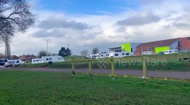 Travellers pitch up at leisure centre after police forced to move riot van which was blockading car park
