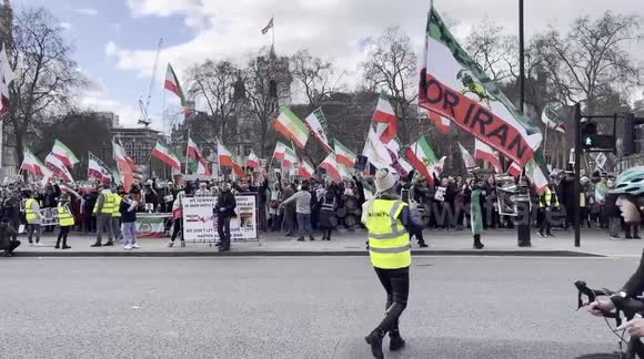 Protesters Gather Outside Parliament In Support Of Reza Pahlavi The