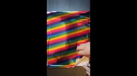 Satisfying ASMR peel of the hand drawn and hand foiled portrait of a cute baby penguin chick by JoyousJoyfulJoyness