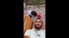 Man's attempt to take cute photo with baby cousin blows up in his face... LITERALLY!