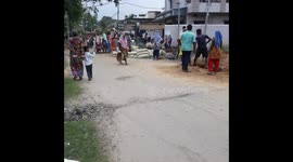 Construction worker working in concrete mixing machine in India