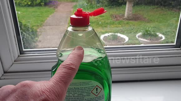 Strange hovering object in washing up liquid bottle
