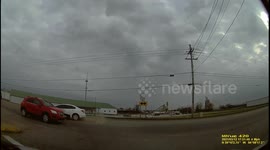 Accident: Woman Makes an Exit Way Too Early and gets Sideswiped