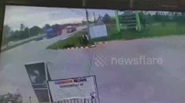 Motorcycle rider somehow survives crash with lorry