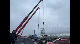 Footage shows dismantling process of two trains that collided in Larissa, Greece