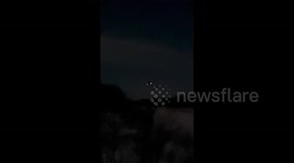 Starlink satellites in the sky above Saint Laurent, Canada