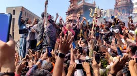 Holi played with ash from burning pyres as huge crowds gather at Manikarnika crematorium, Varanasi