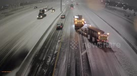 Plows Operating on Hwy 401 During Winter Storm