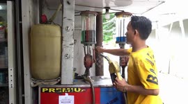 Mini man-powered petrol station in Bali, Indonesia.