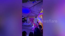 Family hold lively 18th birthday party next to wake