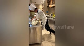 No knead for that! Chef rocks counter as he enthusiastically rolls dough