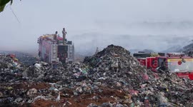 Indian city smothered by toxic fumes from waste dump fire