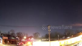 A shooting caught on security camera in Cleveland Heights, OH. 17 shots fired in rapid succession, and the sound of a hit on metal.