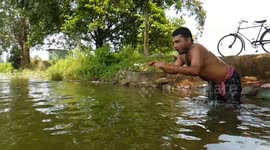 Young Indian Boys Jumping into Water in Slow Motion   Village life