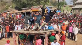 Indian devotees tied to bamboo pole and spun at high speed in unique but risky ritual
