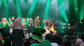 Woman seizes stage and pops question in surprise marriage proposal at London's St Patrick's Festival