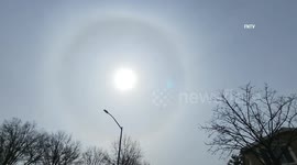 Sun halo over NYC as the calm before the storm