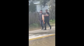 Santa Cruz locals play in the streets, catch fish during atmospheric river