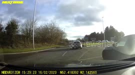 Close Call: BMW Fails to Indicate at a Roundabout Nearly Resulting in a Collision