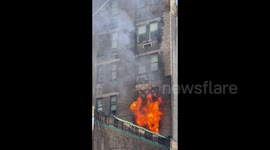 Billionaire fraud suspect's $32 million Manhattan apartment engulfed in flames during FBI search hours after arrest