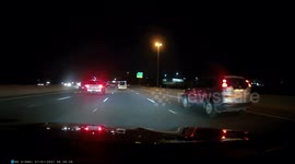 WTF Moment: Blue Bag Dropped Out of Pickup Results in Oncoming Driver Hitting it