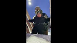 Dad falls while climbing children's slide with child: funny moment caught on camera