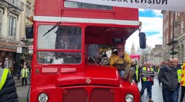 Anti ULEZ party Bus drives down Whitehall to Trafalgar square