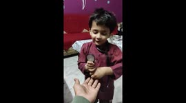 Cute Lil boy playing a role of  surgeon Doctor