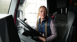 Meet the smallest lorry driver in the world - a 4ft 9in woman who drives a 14ft high tipper truck