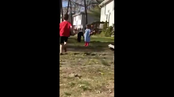 This about sums up our life in 18 seconds. Playing outside the girl is singing and the joy hits his head with a board in an attempt to break it.