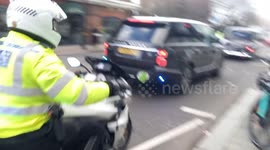 London journalist claims police officer hit him while he was filming King and Queen