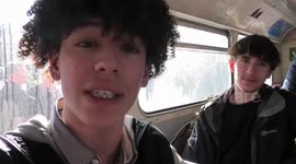 Three young people speak against Sadiq Khan onboard a classic Routemaster bus during  an anti ULEZ protest on Trafalgar Square