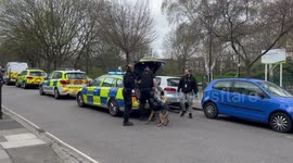 Man is Islington arrested near a school for exposing his self and waving a knife.