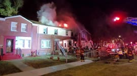 Heroe's rescue: Firefighters pulled from rubble amid raging inferno and collapsed structure