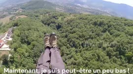Shocking moment turbulent winds sent paraglider hurtling into dense forest in terrifying crash