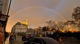 Mesmerizingly beautiful rainbow forms amidst spectacular sunset in London