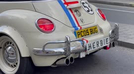 A Wolkswagen Beetle decorated as Herbie, The Love Bug spotted in busy London road