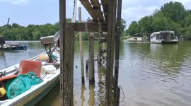 Residents use miner boat services to cross Sungai Sepang in Port Dickson and Sungai Pelek, Selangor