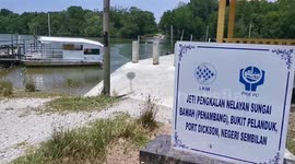 Residents use miner boat services to cross Sungai Sepang in Port Dickson and Sungai Pelek, Selangor