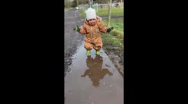 When logic says 'jump' but the mind says 'dive' *Toddler's funny puddle debacle*